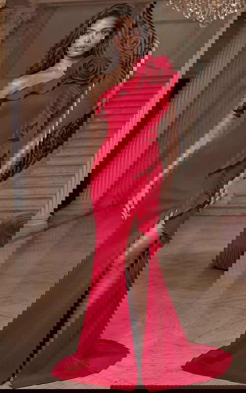 One shoulder evening gown with ruffled trim and floral applique detail