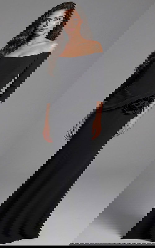 Off shoulder long sleeve gown with fitted silhouette and waist rosette