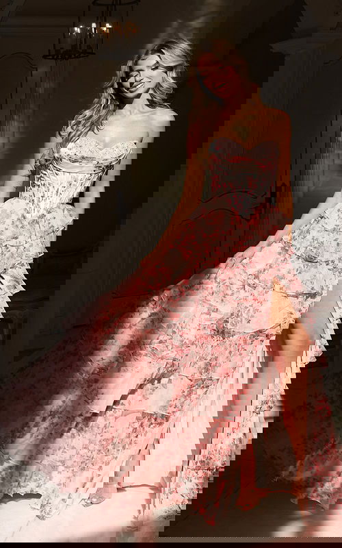 Floral tiered gown with corset bodice and sweetheart neckline